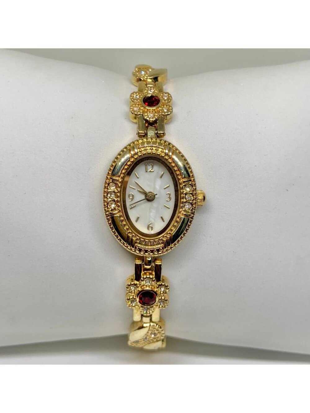 Allude gold tone women’s watch red stones 19mm floral links up to 7.5” running